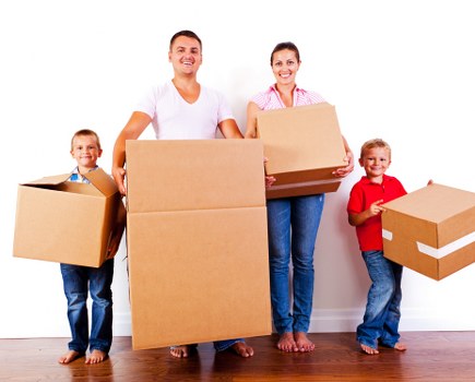 Packing boxes and fragile household items in a West Kensington flat