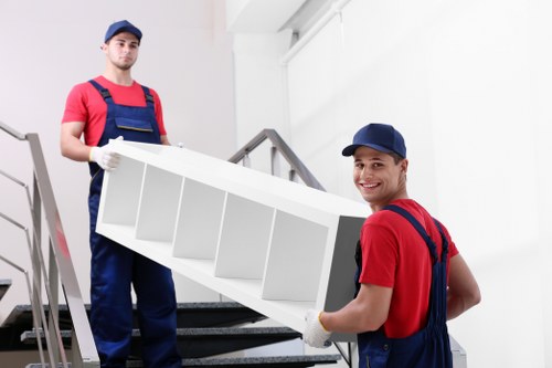 House removals team working in a West Kensington residential street