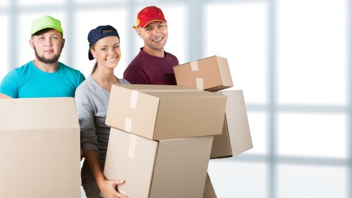 Organised office relocation support in West Kensington with equipment and furniture