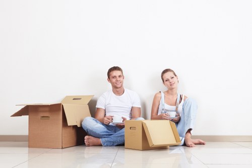 Careful loading of household items for a West Kensington move