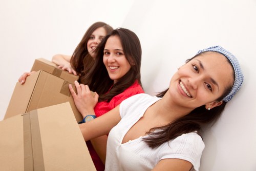 Loading student furniture and boxes into a removal vehicle