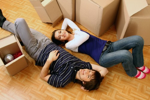 Professional commercial movers handling office furniture and equipment
