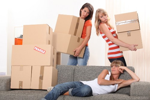 Prepared moving day checklist and packing materials for a West Kensington move